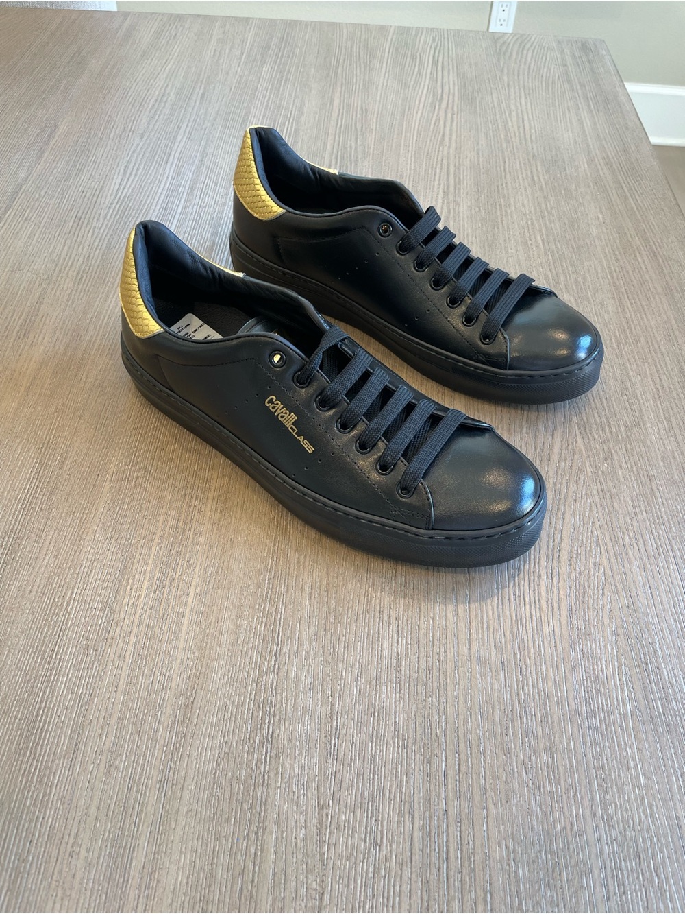 Cavalli Class mens Leather Low Top Sneaker In Black/Gold size 11.5/44.5